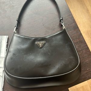 Used Prada bag, some imperfections